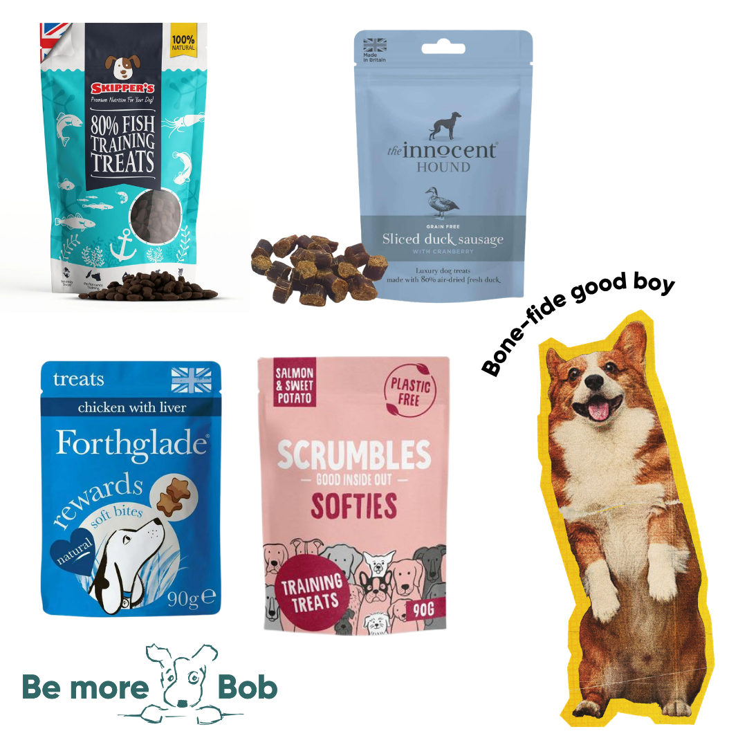 Collection of dog treats and a dog-shaped sign with text and branding.