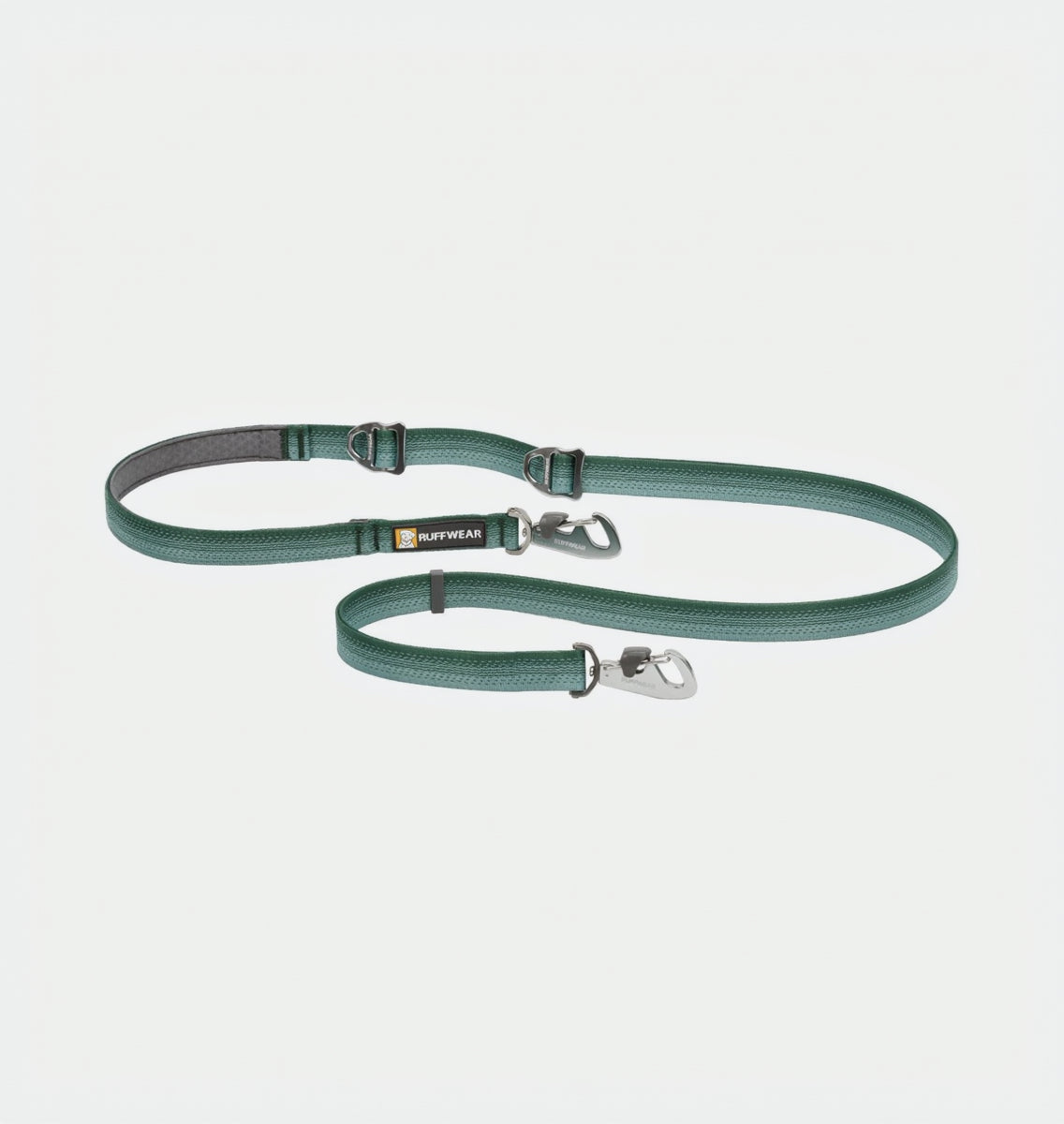 A green, adjustable, double-ended pet leash with Ruffwear brand visible on the strap and Crux Clips.