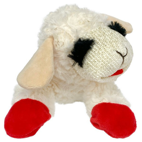 Plush toy sheep with red feet on a white background