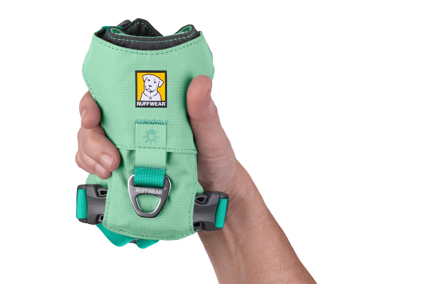 Ruffwear hi and light harness folded small in someone's hand