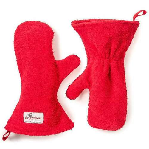A pair of red gauntlets designed for dogs, made of absorbent fabric, with a brand tag visible.
